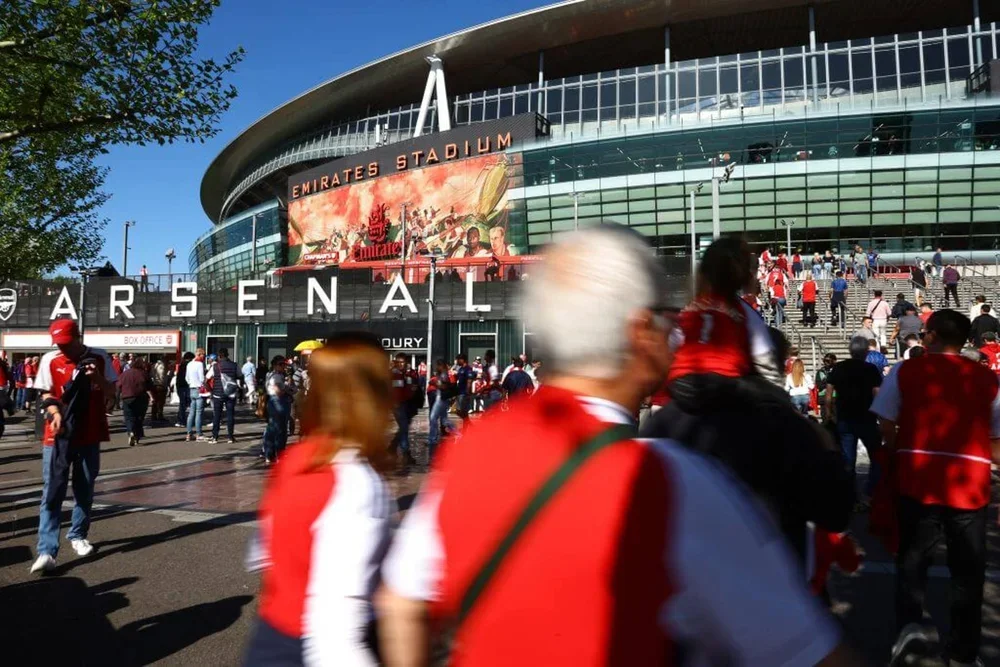 Fans outside Arsenal's Emirates Stadium