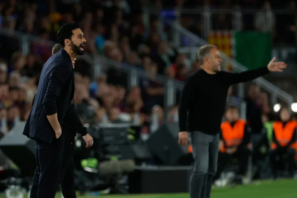 Álvaro Arbeloa y Hansi Flick.